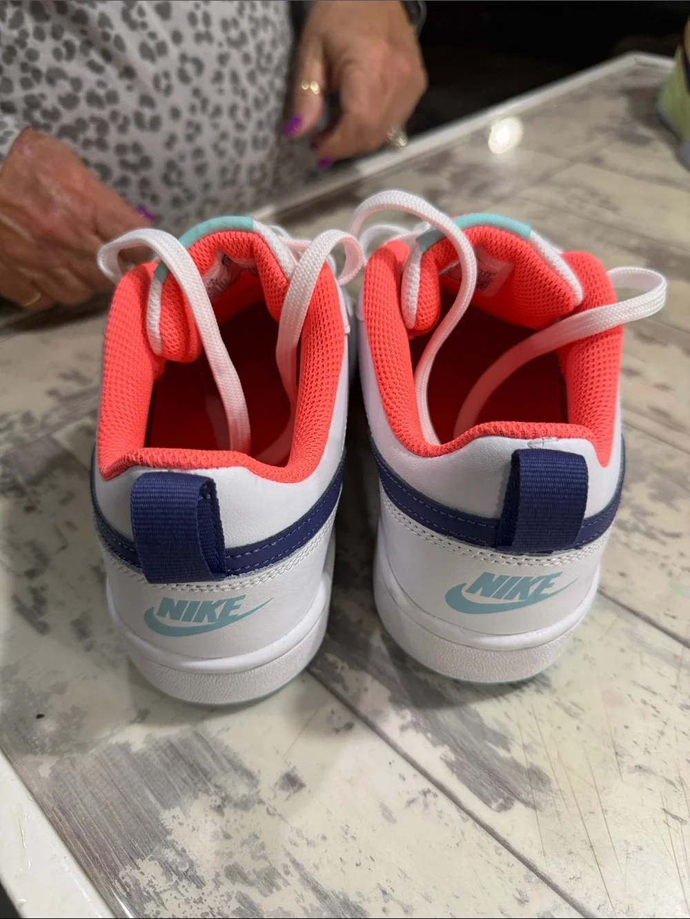 Nike White Low-Top Sneakers with Navy Swoosh & Coral-Pink Lining
